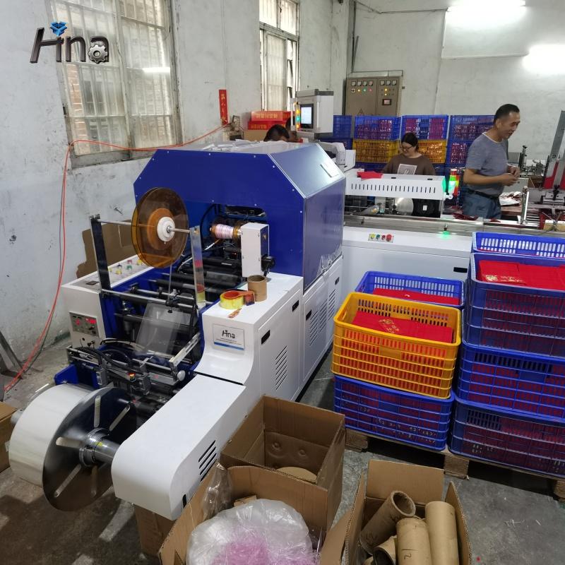 Automatic Bag inserting Machine for notebook plastic packaging